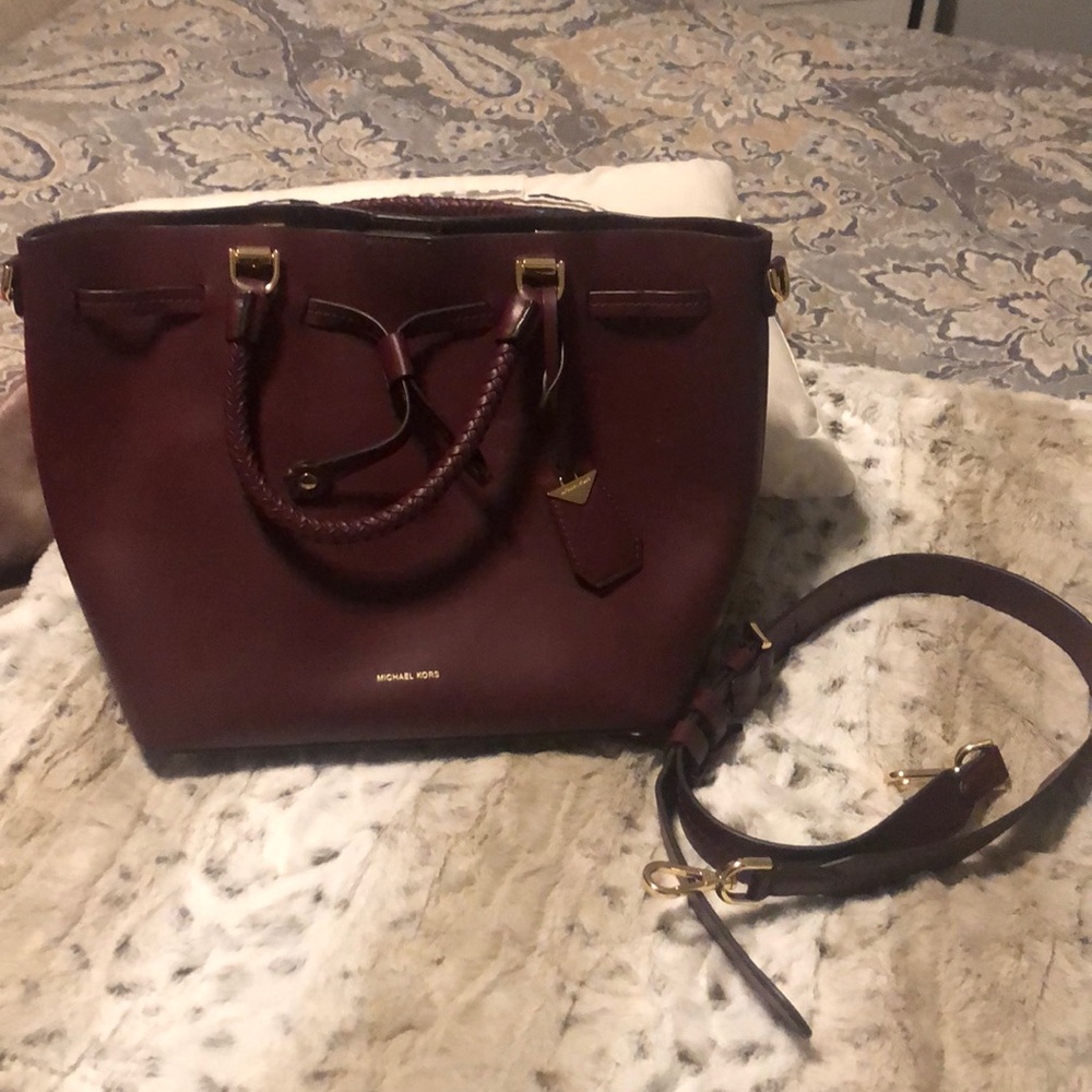 Beautiful wine colored Michael Kors bag